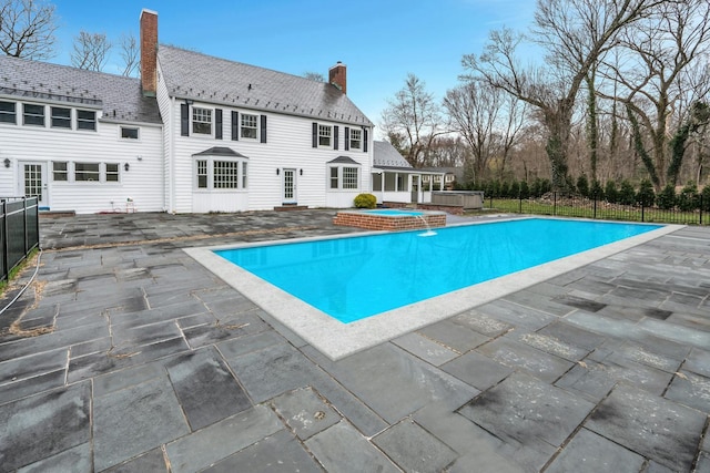 539 Split Rock Rd, Syosset, NY 11791 - view of pool with a hot tub, fence, a fenced in pool, and a patio area