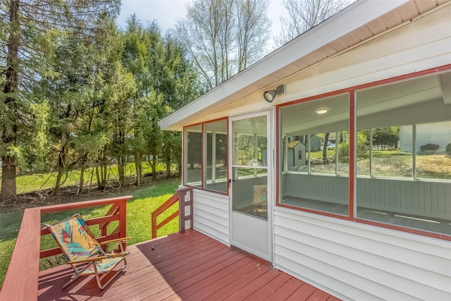 wooden terrace with a sunroom