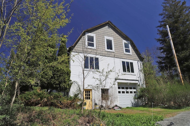 view of front of property featuring an attached garage