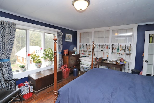 bedroom with wood finished floors