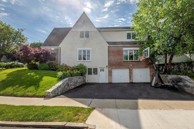 126 Lincoln Ave E, West Harrison, NY 10604 - view of property exterior with stucco siding, brick siding, aphalt driveway, a garage, and a lawn