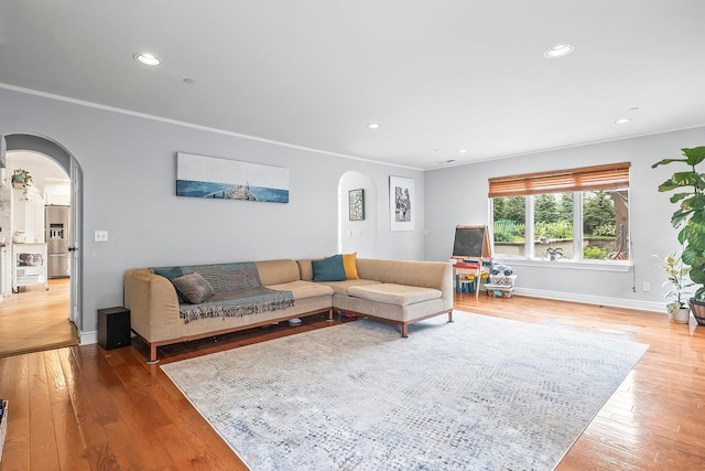 126 Lincoln Ave E, West Harrison, NY 10604 - living room featuring hardwood / wood-style floors, baseboards, recessed lighting, and arched walkways