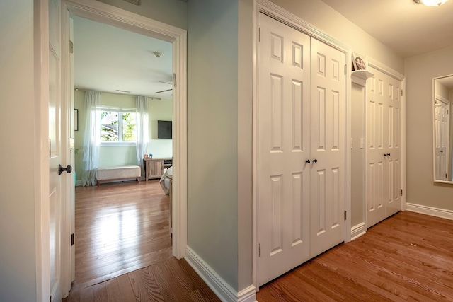126 Lincoln Ave E, West Harrison, NY 10604 - hallway featuring wood finished floors and baseboards