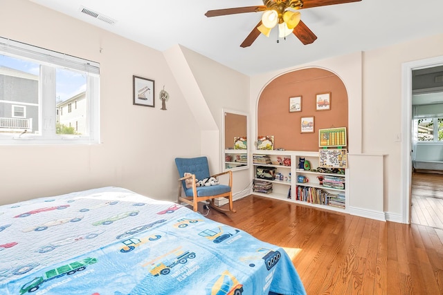 126 Lincoln Ave E, West Harrison, NY 10604 - bedroom with visible vents, wood finished floors, and ceiling fan