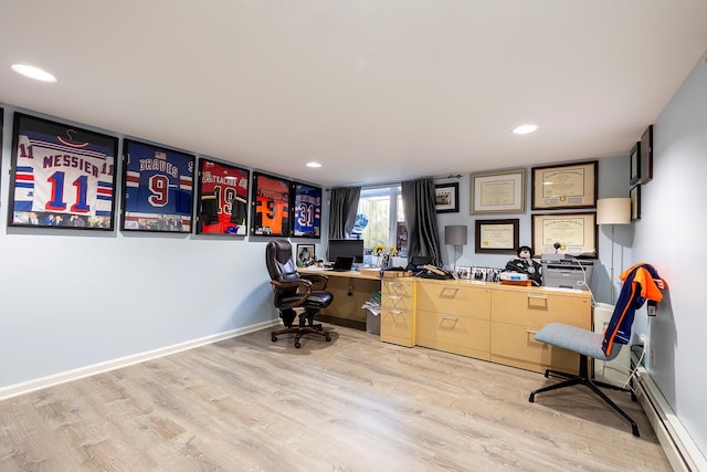 126 Lincoln Ave E, West Harrison, NY 10604 - home office featuring recessed lighting, wood finished floors, and a baseboard radiator