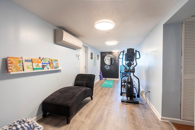 126 Lincoln Ave E, West Harrison, NY 10604 - interior space with wood finished floors, a wall mounted AC, and baseboards