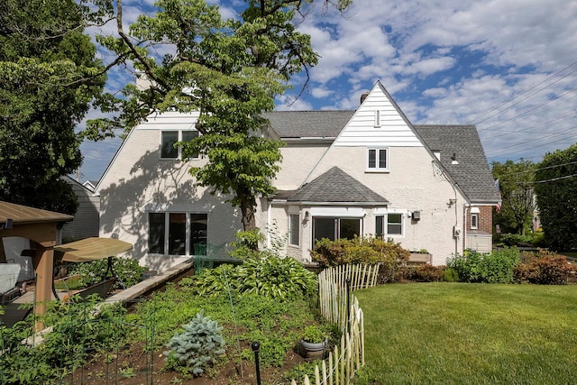 126 Lincoln Ave E, West Harrison, NY 10604 - view of front of property featuring a front lawn, a shingled roof, stucco siding, and fence