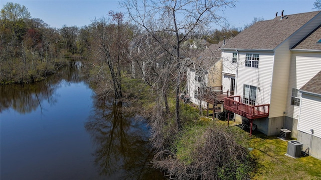 115 Turnberry Ct, Poughkeepsie, NY 12603 - exterior space featuring central AC unit, a deck with water view, and a shingled roof