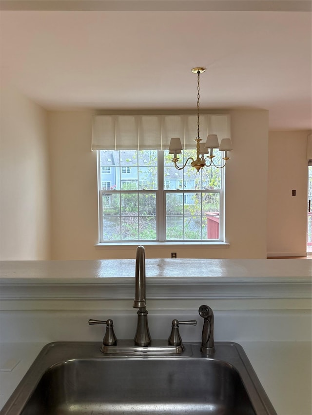 115 Turnberry Ct, Poughkeepsie, NY 12603 - room details featuring a sink and a chandelier