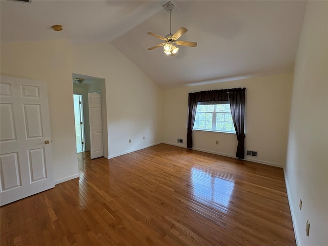 115 Turnberry Ct, Poughkeepsie, NY 12603 - unfurnished room with visible vents, lofted ceiling, wood finished floors, baseboards, and a ceiling fan
