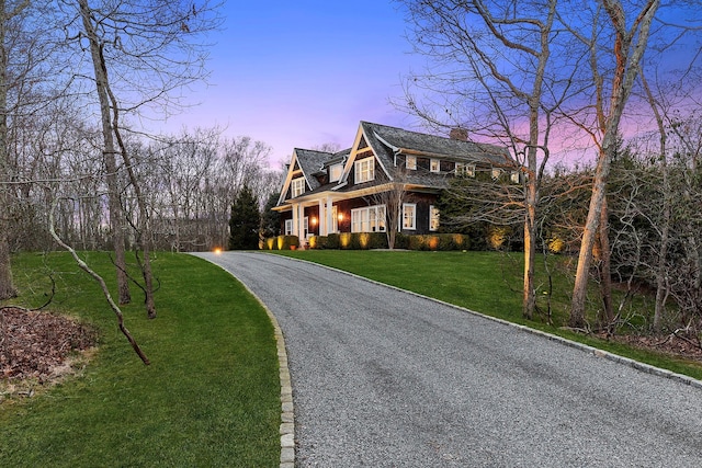 471 Middle Line Hwy, Sag Harbor, NY 11963 - view of front facade with a front yard, driveway, and a chimney