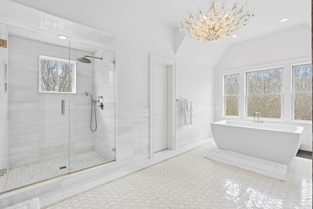 471 Middle Line Hwy, Sag Harbor, NY 11963 - bathroom featuring a stall shower, a freestanding bath, and a healthy amount of sunlight