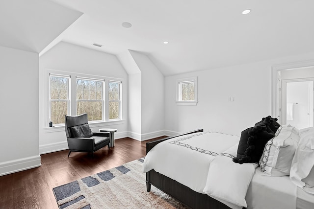 471 Middle Line Hwy, Sag Harbor, NY 11963 - bedroom with lofted ceiling, visible vents, baseboards, recessed lighting, and wood finished floors