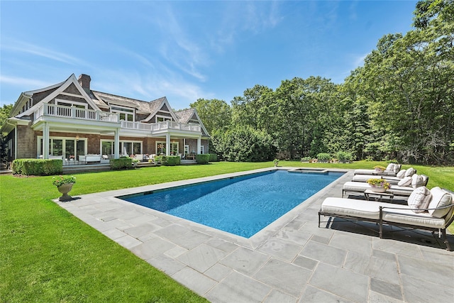 471 Middle Line Hwy, Sag Harbor, NY 11963 - outdoor pool with a patio area, a lawn, and an outdoor living space