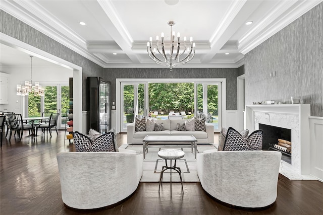471 Middle Line Hwy, Sag Harbor, NY 11963 - living area featuring a chandelier, wallpapered walls, crown molding, a high end fireplace, and wainscoting