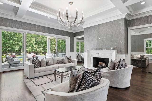 471 Middle Line Hwy, Sag Harbor, NY 11963 - living area featuring coffered ceiling, a chandelier, a premium fireplace, crown molding, and wood finished floors