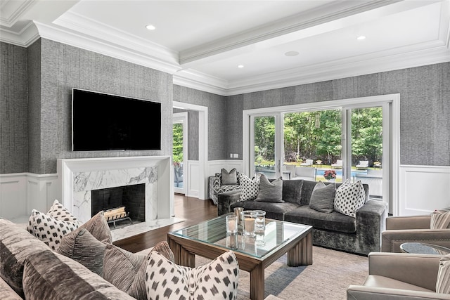 471 Middle Line Hwy, Sag Harbor, NY 11963 - living area featuring ornamental molding, a wainscoted wall, wallpapered walls, a fireplace, and wood finished floors