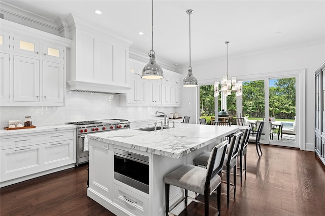 471 Middle Line Hwy, Sag Harbor, NY 11963 - kitchen with premium range, a chandelier, white cabinets, recessed lighting, and crown molding