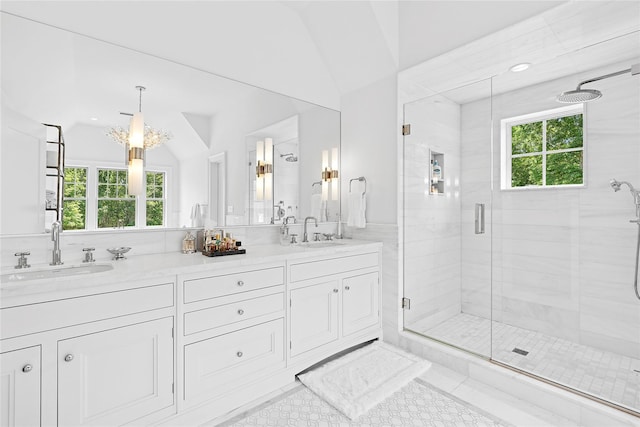 471 Middle Line Hwy, Sag Harbor, NY 11963 - full bath with a shower stall, double vanity, tile patterned flooring, and lofted ceiling