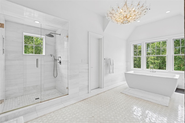 471 Middle Line Hwy, Sag Harbor, NY 11963 - bathroom with plenty of natural light, a shower stall, a soaking tub, a chandelier, and recessed lighting