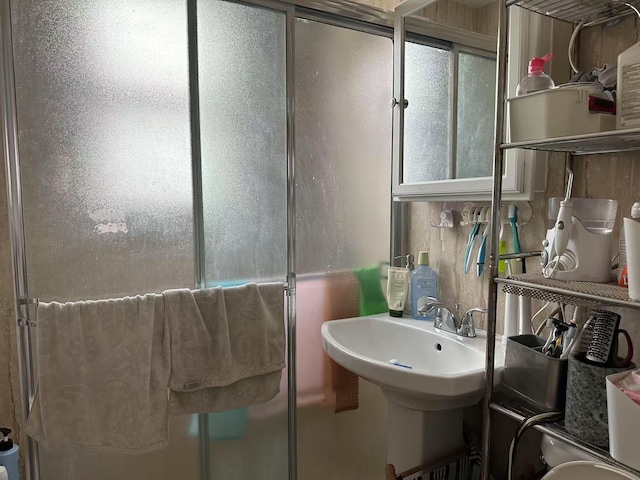 bathroom featuring a stall shower