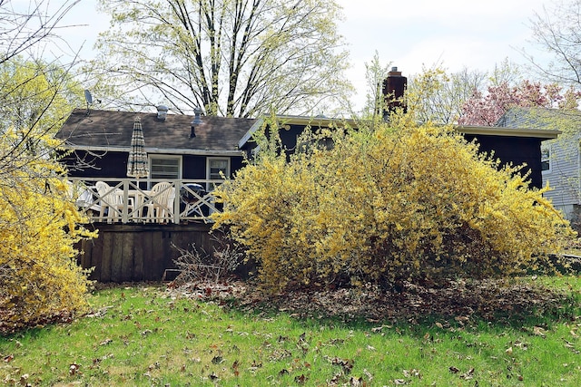 view of yard featuring a wooden deck