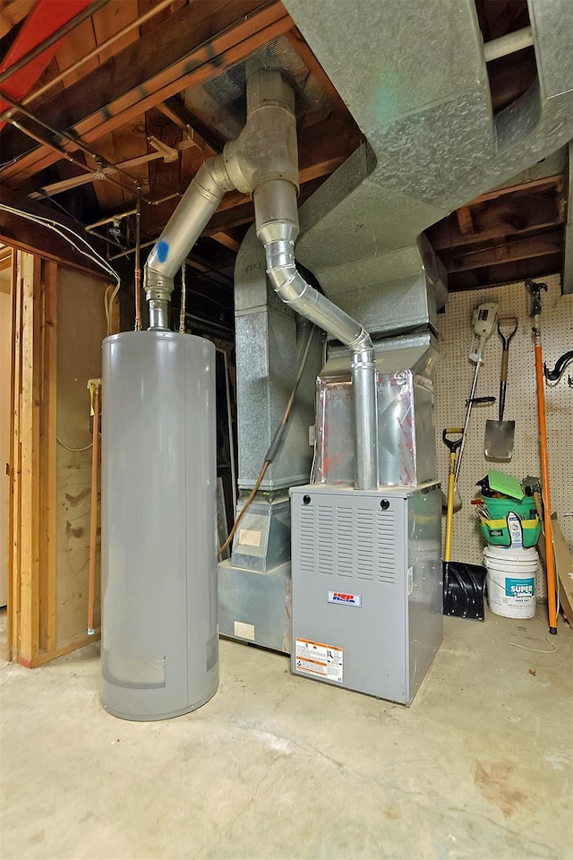 utility room featuring heating unit and water heater