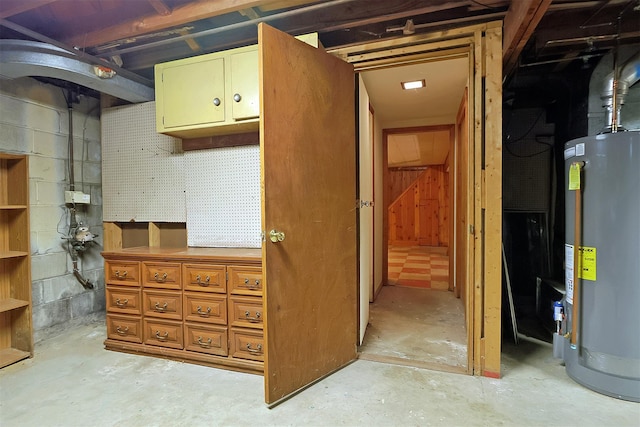 unfinished below grade area with gas water heater
