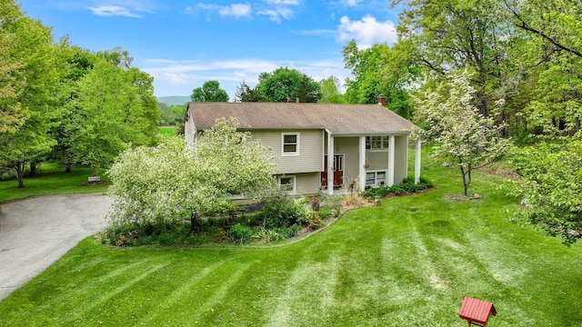 15 Hickory Hill Dr, Warwick, NY 10990 - bi-level home featuring a front yard and a chimney