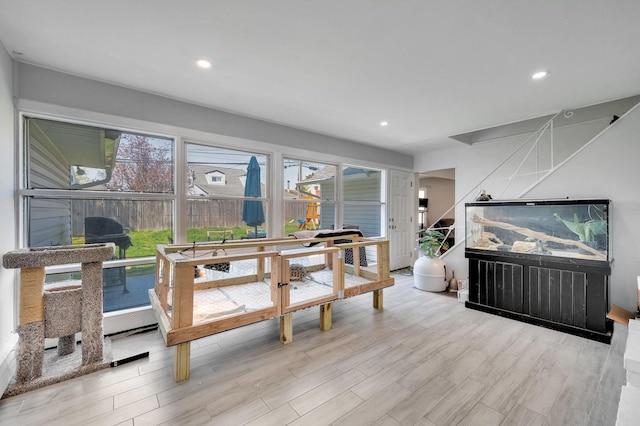 dining room featuring recessed lighting and wood finished floors