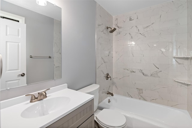 bathroom with toilet, bathing tub / shower combination, and vanity
