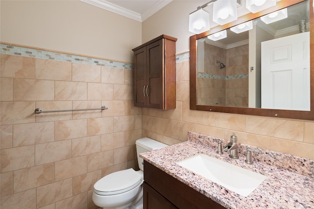 full bathroom featuring crown molding, tile walls, vanity, toilet, and tiled shower