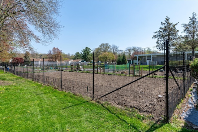 surrounding community featuring fence