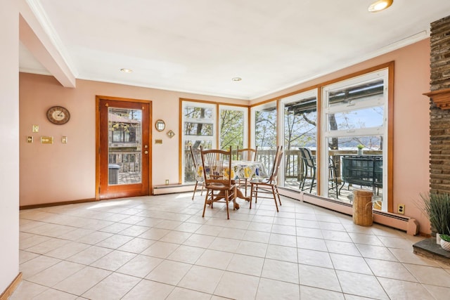 dining space featuring recessed lighting, light tile patterned floors, a wealth of natural light, and ornamental molding