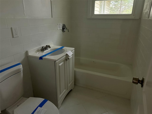 full bath featuring toilet, tile walls, tile patterned flooring, and vanity