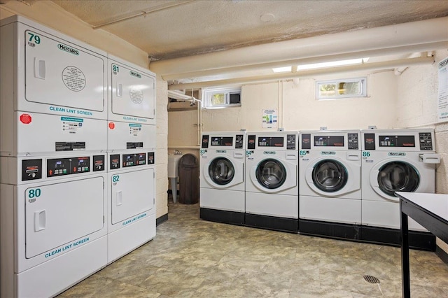 10 Bryant Cres Unit 2A, White Plains, NY 10605 - community laundry room with washer and dryer and stacked washing maching and dryer