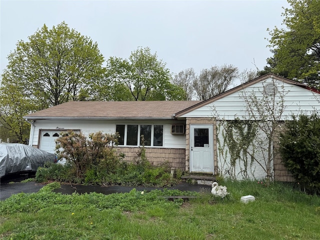 11 Columbus Ave, Brentwood, NY 11717 - ranch-style house featuring an attached garage