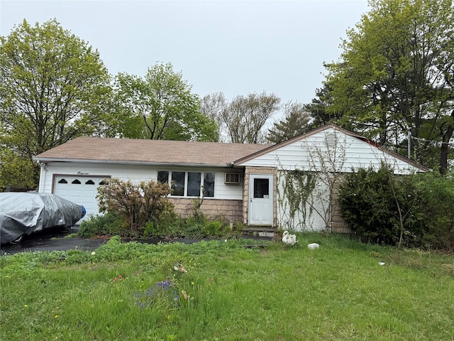 11 Columbus Ave, Brentwood, NY 11717 - ranch-style house with a garage