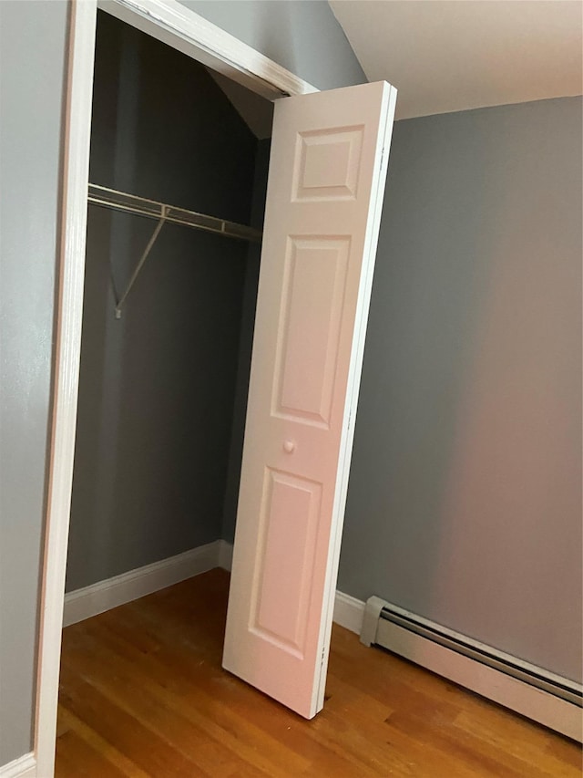 closet featuring a baseboard radiator