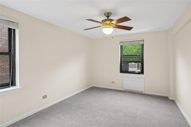 212-03 75th Ave Unit 5A, Bayside, NY 11364 - carpeted empty room with ceiling fan, baseboards, and cooling unit
