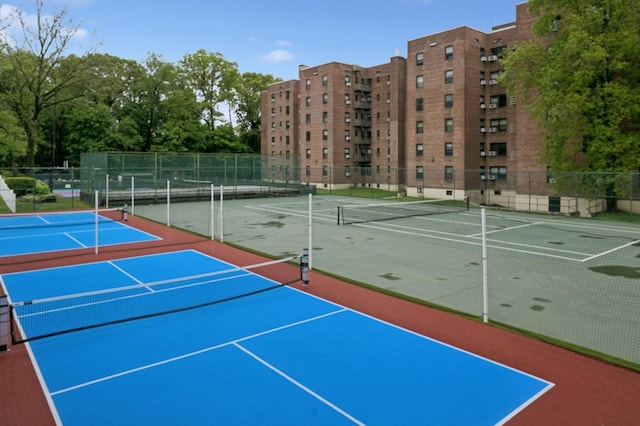 212-03 75th Ave Unit 5A, Bayside, NY 11364 - view of tennis court featuring fence and community basketball court