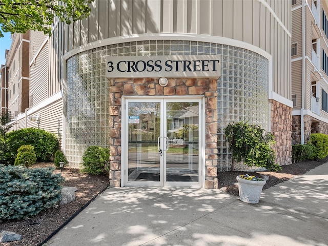 3 Cross St Unit 202, Suffern, NY 10901 - entrance to property with board and batten siding and stone siding