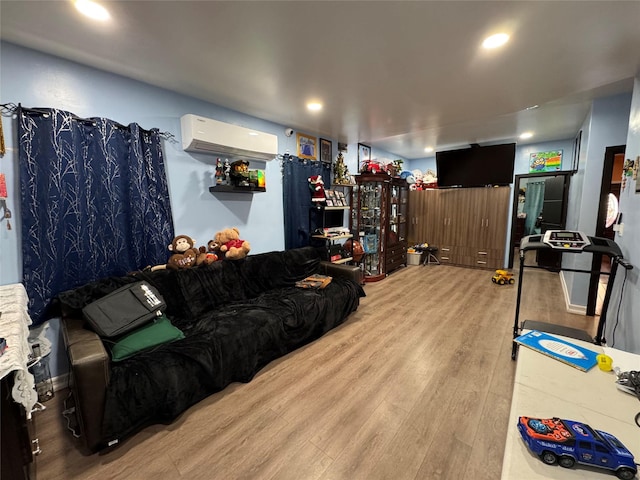 33-40 101st St, Corona, NY 11368 - living area featuring wood finished floors, recessed lighting, and an AC wall unit