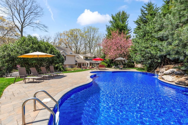 pool featuring a patio area
