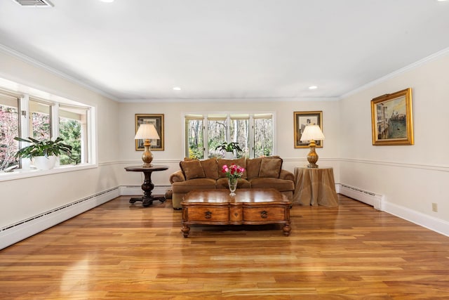 living room with recessed lighting, light wood-style floors, visible vents, ornamental molding, and baseboard heating