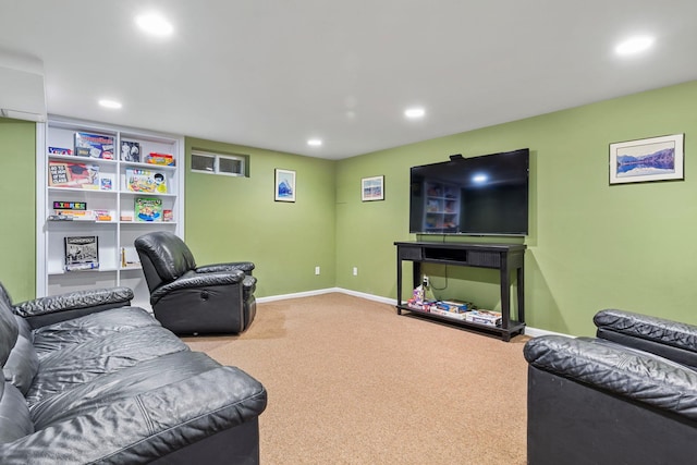 carpeted living room featuring recessed lighting and baseboards