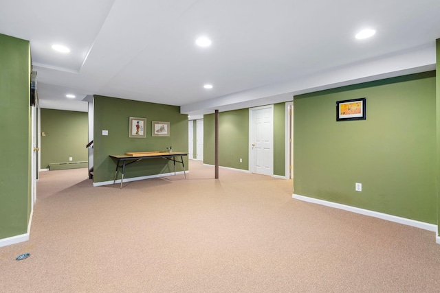 finished basement featuring recessed lighting, carpet flooring, baseboard heating, and baseboards