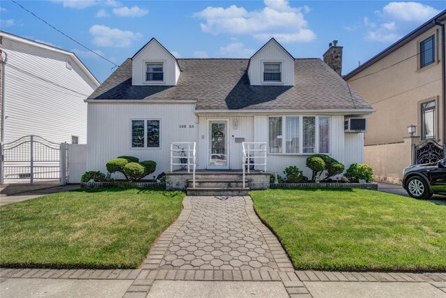 158-35 91st St, Howard Beach, NY 11414 - cape cod home with a chimney, a gate, roof with shingles, and a front yard