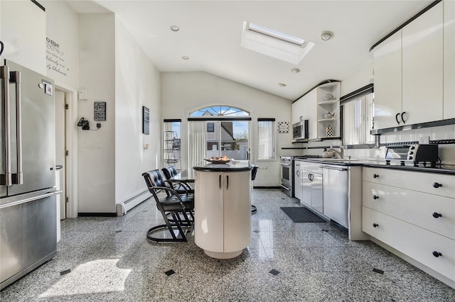 158-35 91st St, Howard Beach, NY 11414 - kitchen featuring dark countertops, appliances with stainless steel finishes, open shelves, a center island, and baseboards