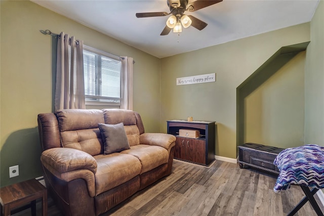 158-35 91st St, Howard Beach, NY 11414 - sitting room with baseboards, a ceiling fan, and wood finished floors